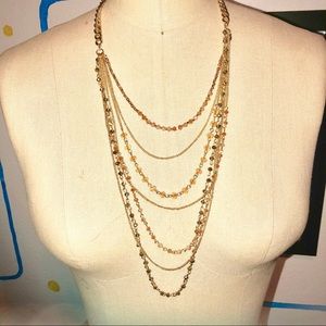 Multi tiered gold necklace